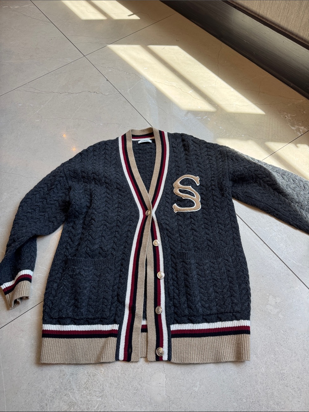 Sandro Black Cable-Knit Cardigan with Beige Trim and Maroon Accents